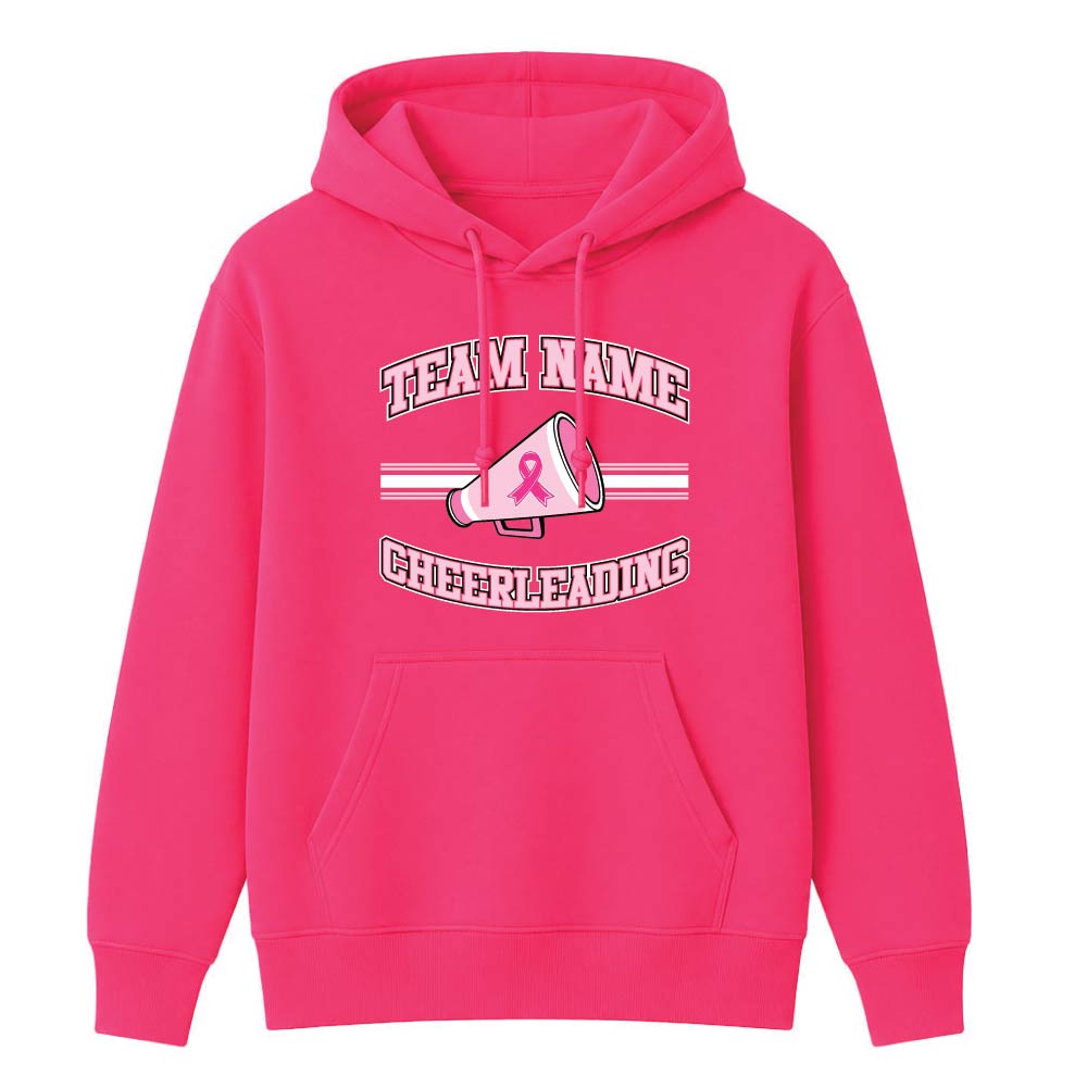 Pink cheerleading breast cancer awareness design featuring a cheer megaphone with a pink ribbon, customizable team name, and varsity-style "Cheerleading" text.